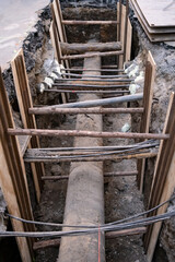 The street undergoes infrastructure maintenance, with a replacement of sewer and water systems....