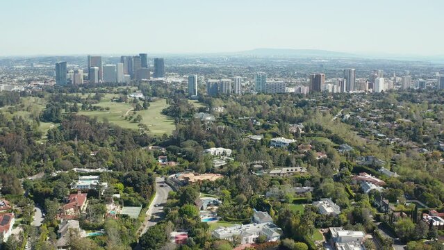 Aerial shot of Century City and Westwood building and golf course in Los Angeles