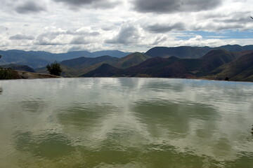 Pool surrounded by mountains at Hierve el Agua in San Lorenzo Albarradas,  Oaxaca, Mexico