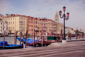 View of the Grand Canal in Venice. The urban landscape of Venice with gondolas and lanterns.