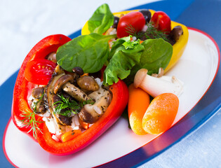 Delicious stuffed peppers with mushrooms, rice, sesame, herbs and vegetables