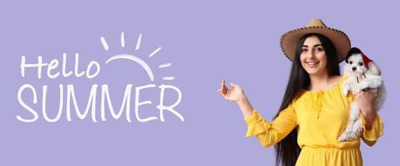 Pretty young woman holding her dog on lilac background. Hello, summer