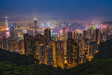 Hong Kong Victoria's Peak viewpoint Vibrant Cityscape at Night with Illuminated Skyscrapers