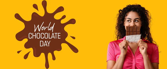 Beautiful young African-American woman with sweet chocolate bar on yellow background