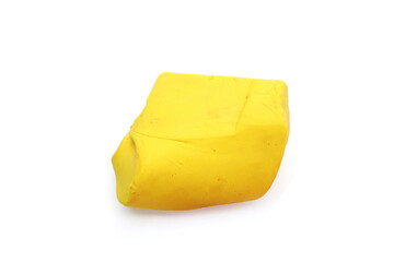 Colorful plasticine clay on white background.