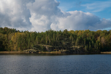 Fototapeta premium Lake Ladoga near the village Lumivaara on a sunny autumn day, Ladoga skerries, Lakhdenpokhya, Republic of Karelia, Russia