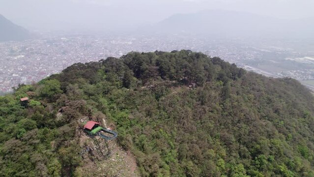 Aerial view in orbit mode of the Crystal Watchtower on Cerro del Borrego in Orizaba, Veracruz