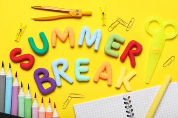 Text SUMMER BREAK and different stationery on yellow background. Closeup