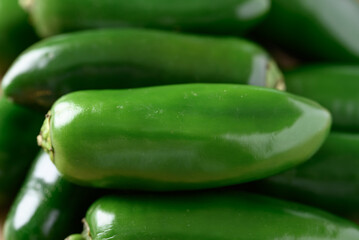 Fresh green Jalapeno chili, Food background