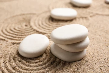 Tuinposter Zen stones on sand with pattern © Pixel-Shot
