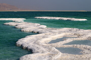 The Dead Sea is a closed, endorheic body of water in the Middle East between Israel and Jordan.