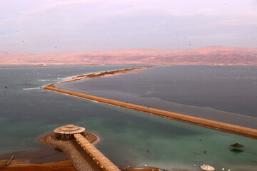 The Dead Sea is a closed, endorheic body of water in the Middle East between Israel and Jordan.