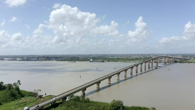 Drone view of Jules Wijdenbosch bridge captured with mavic 2 pro, flyover Suriname river in port of Paramaribo, capital of Suriname