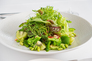 green salad on the white plate