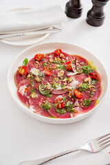 beef carpaccio on the white plate