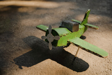 Antique aircraft made of cardboard.