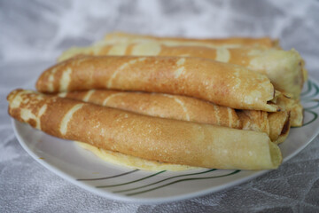 Closeup of home pancakes on white background.