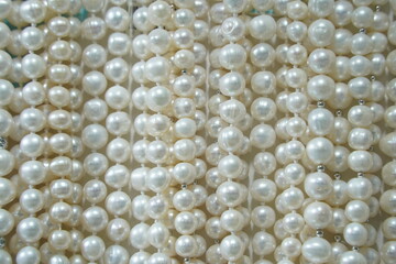 A string of pearl beads. Decoration.