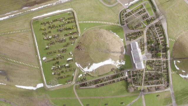 Historical Site, Jelling Burial Mounds, Runic Stones, And Church In Jelling, Denmark - Aerial Drone Shot