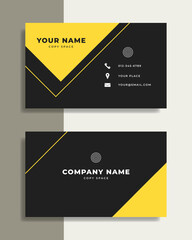 Double sided contemporary geometric business card. Diagonal shapes and lines with yellow and black colors.
