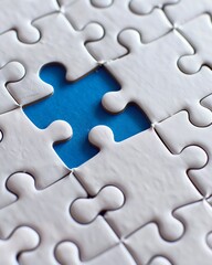 A white jigsaw puzzle with one blue piece missing, symbolizing the last piece of an elegant and minimalistic pattern, closeup shot, macro photography, studio lighting, sharp focus, white background, h