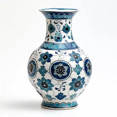 Fotobehang Traditional blue and white vase with intricate floral patterns against a clean background. © cherezoff