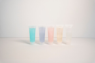 mockups for cosmetics colored liquid jars lip gloss cream gel shampoo 