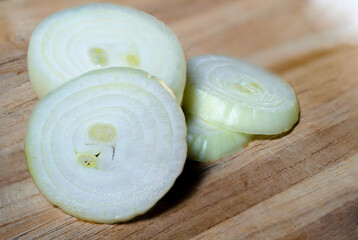 Sliced yellow onion on cutting board