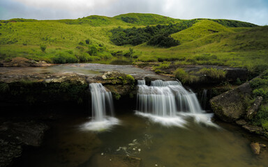 Fototapeta premium Cascading Majesty: Unveiling the Waterfalls of Meghalaya