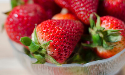 Strawberries in bowl close up