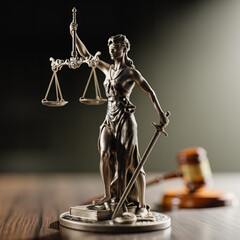 Legal Concept: Themis is the goddess of justice and the judge's gavel hammer as a symbol of law and order - 785934178