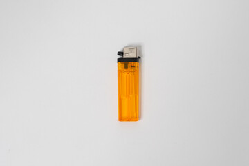 This orange liquid gas lighter is a multi-purpose lighter that is easy to carry