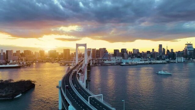 Tokyo skyline with Tokyo tower and rainbow bridge. Tokyo, Japan.
