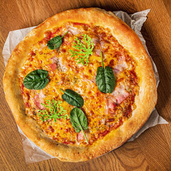 italian pizza on the wooden background