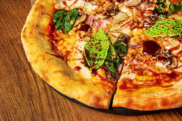 italian pizza on the wooden background