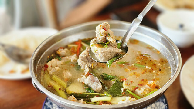 Tom Zabb Hot and Spicy Soup with Pork Ribs. Hot and Spicy Pork Prime Ribs Soup. Thai Food. Tom Zab Graduk Moo. 