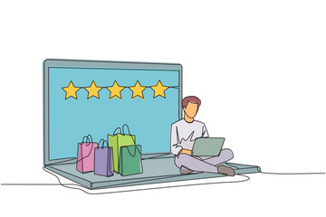 Single continuous line drawing happy man sitting on giant laptop typing on laptop computer. Bought a lot from online shop. Give a rating of 5 stars. Ecommerce. One line design vector illustration
