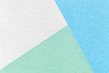 Texture of craft white, green and blue shade color paper background, macro. Vintage abstract pastel...