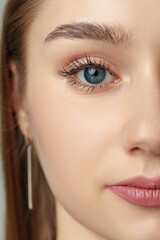 Close Up of Womans Face With Blue Eyes