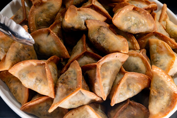 Lebanese Spinach Pies traditional Fatayer fried in oil