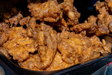 Korean food, asian fast food, fermented chicken pieces deep fried in oil