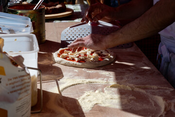 Making of fresh Italian pizza, street food, Portobello road food market on Saturday, London, UK - 785974529