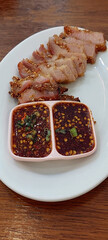 Spicy Grilled Pork Neck Delight, Restaurant in Bangkok.