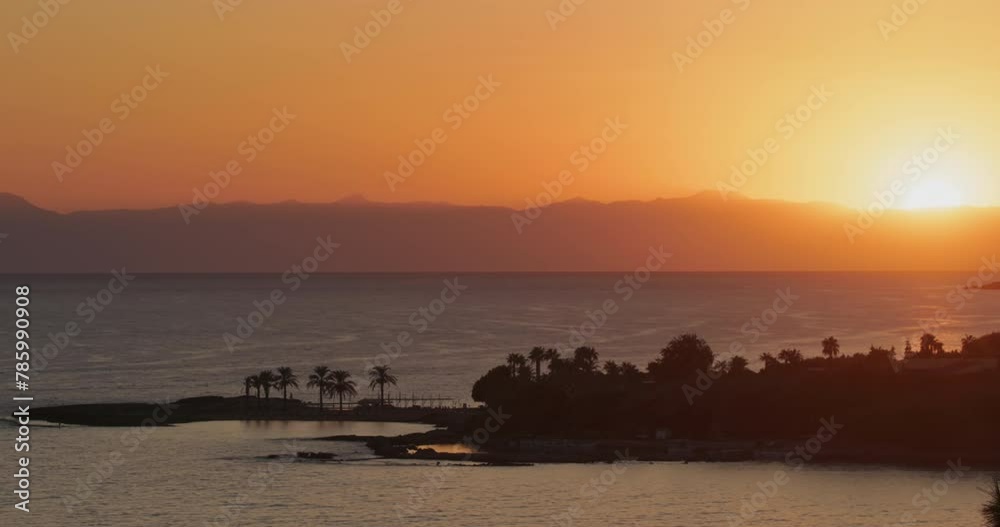 Wall mural amazing sun sunrise above sea ocean palm beach. resort paradise landscape during morning. sky natura