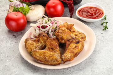 Grilled chicken wings with sauce