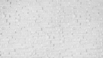 stone cladding wall made of regular white bricks. wall panels for interior or exterior decoration, background and texture. white wall made from grunge stone material for modern style decoration.