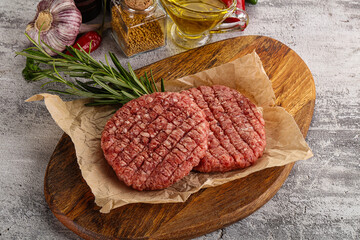Raw burger cutlet for grill - obrazy, fototapety, plakaty