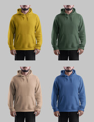 Mockup of colorful oversized hoodies with pocket, ties, streetwear on bearded man, sweatshirt with label for design, branding.