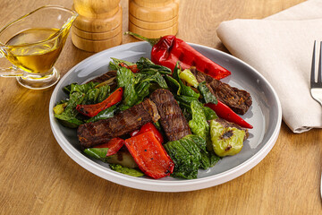 Salad with grilled beef steak