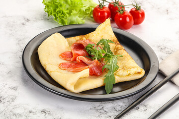 Russian pancake with salmon fish